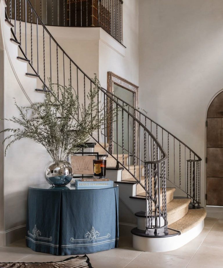 Elegant Entryway: A Timeless Staircase with Classic Decor Accents